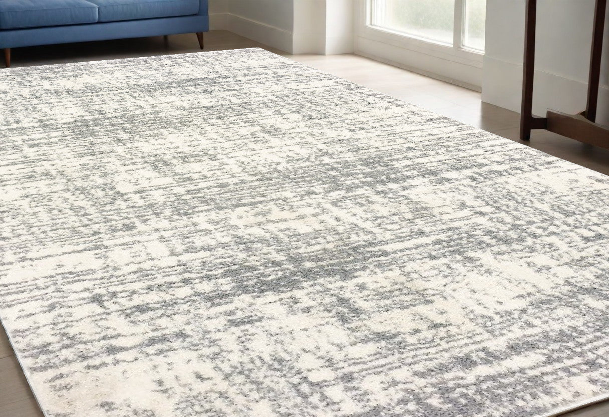 8' X 11' Ivory And Gray Abstract Strokes Area Rug