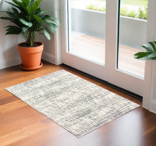 2' X 3' Gray and Ivory Shag Power Loom Area Rug