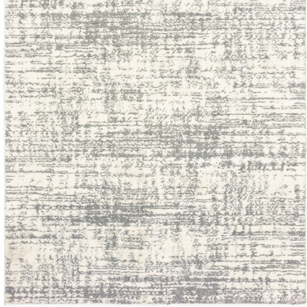 2' X 3' Gray and Ivory Shag Power Loom Area Rug