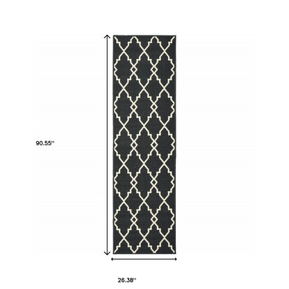 2' X 8' Black and Ivory Indoor Outdoor Area Rug