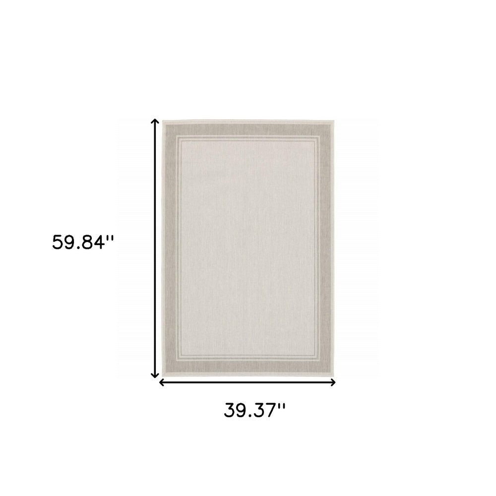 7' X 9' Gray And Ivory Indoor Outdoor Area Rug