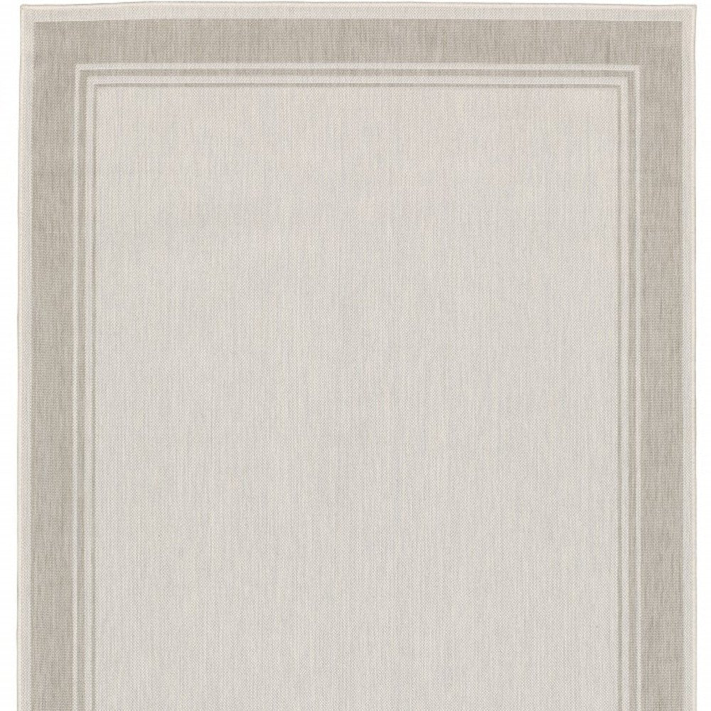 7' X 9' Gray And Ivory Indoor Outdoor Area Rug
