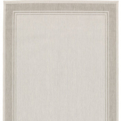 7' X 9' Gray And Ivory Indoor Outdoor Area Rug