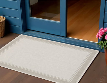 7' X 9' Gray And Ivory Indoor Outdoor Area Rug