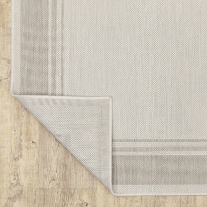7' X 9' Gray And Ivory Indoor Outdoor Area Rug
