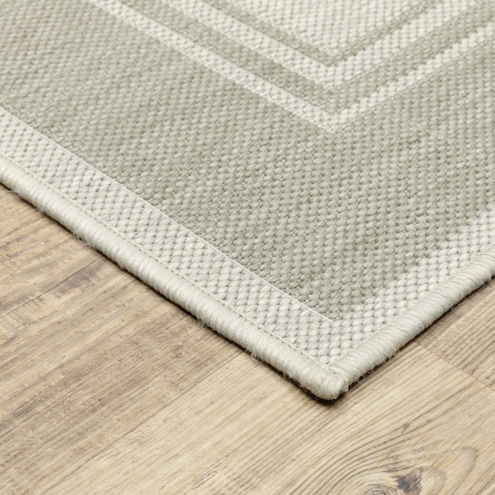 7' X 9' Gray And Ivory Indoor Outdoor Area Rug