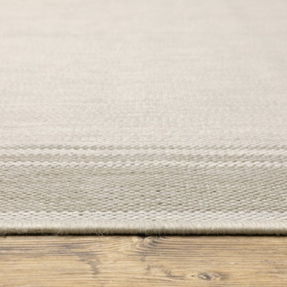 7' X 9' Gray And Ivory Indoor Outdoor Area Rug