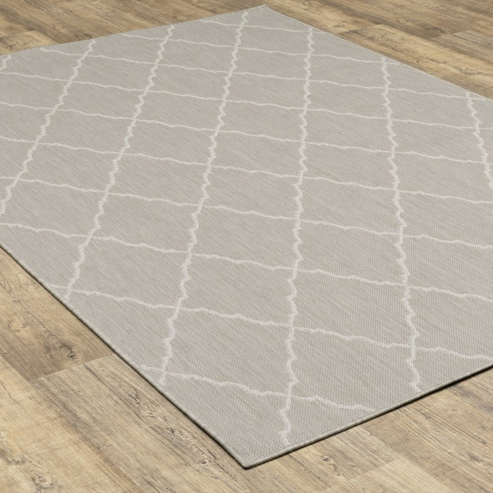 7' X 9' Gray And Ivory Indoor Outdoor Area Rug
