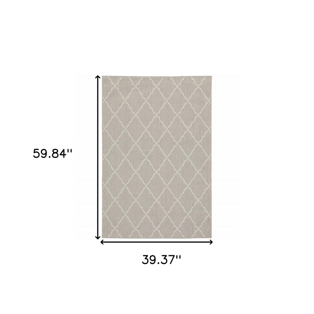 7' X 9' Gray And Ivory Indoor Outdoor Area Rug