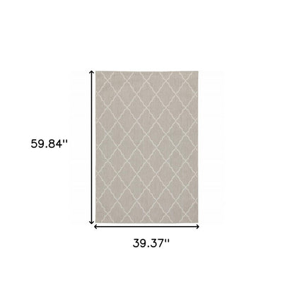 7' X 9' Gray And Ivory Indoor Outdoor Area Rug