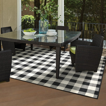 2' X 4' Black and Ivory Indoor Outdoor Area Rug