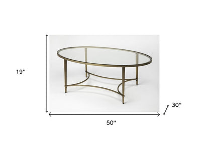 50" Clear and Gold Glass and Metal Oval Coffee Table