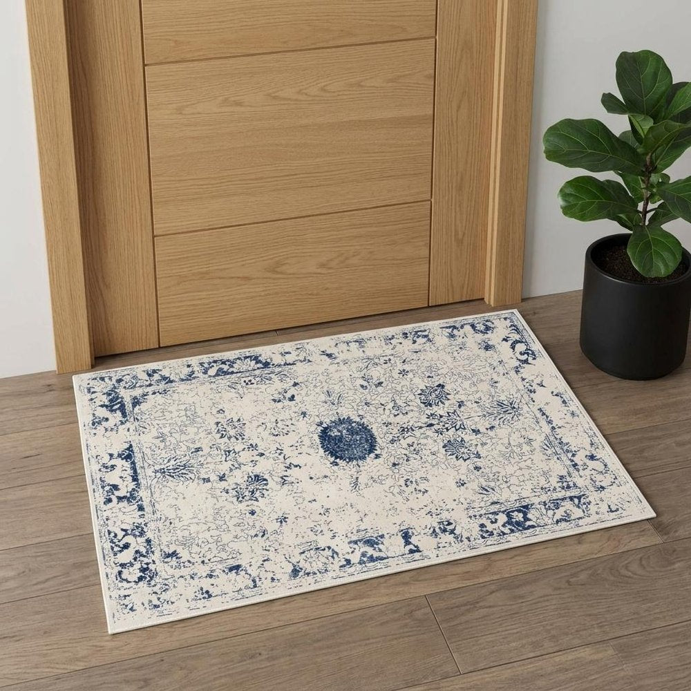 4' X 6' Navy Blue Distressed Floral Area Rug