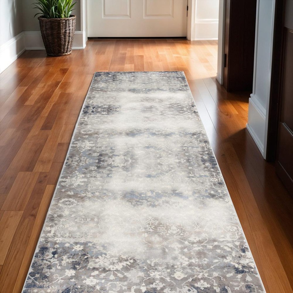 5' X 8' Navy And Beige Distressed Vines Area Rug