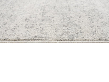 2' X 5' Ivory and Gray Ikat Power Loom Distressed Area Rug