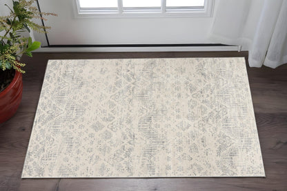 2' X 5' Ivory and Gray Ikat Power Loom Distressed Area Rug