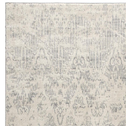 5' X 8' Ivory Distressed Ikat Pattern Area Rug