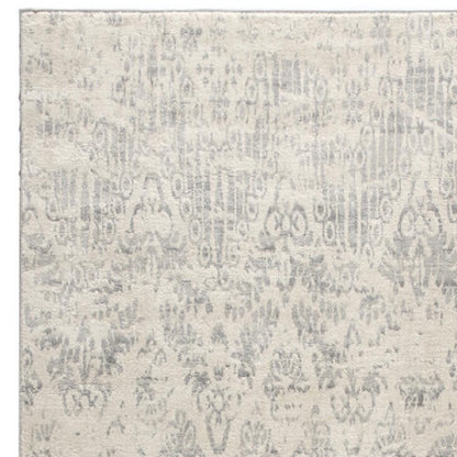 2' X 5' Ivory and Gray Ikat Power Loom Distressed Area Rug