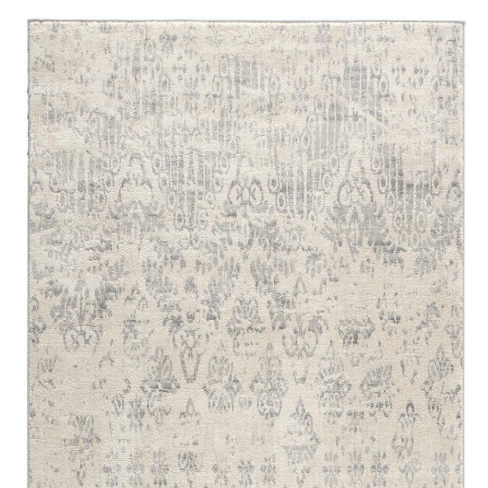 5' X 8' Ivory Distressed Ikat Pattern Area Rug
