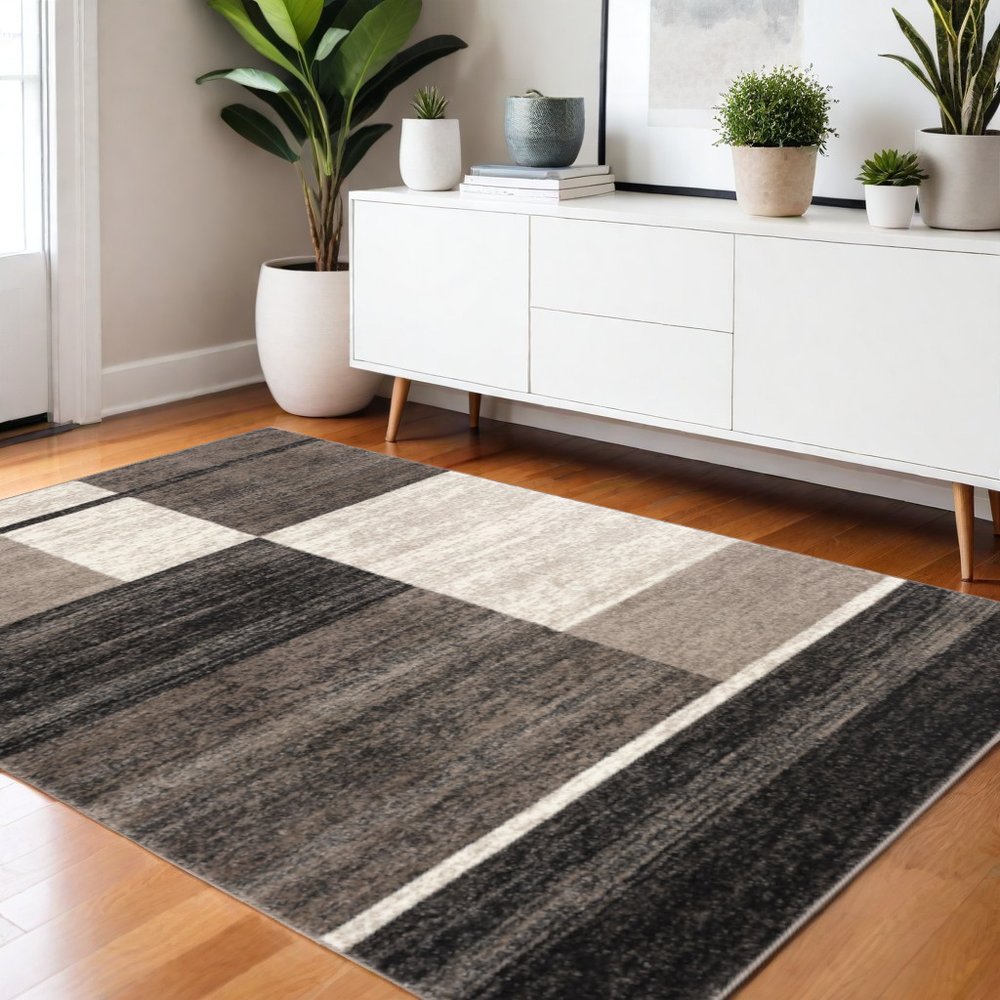 5' X 8' Brown And Beige Abstract Blocks Area Rug