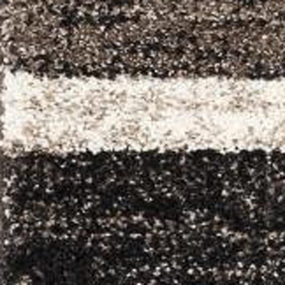 5' X 8' Brown And Beige Abstract Blocks Area Rug