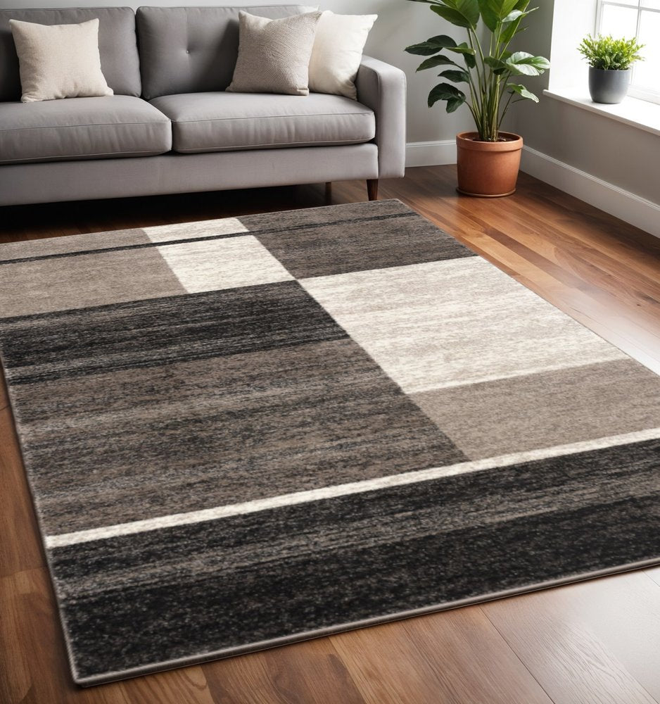 5' X 8' Brown And Beige Abstract Blocks Area Rug