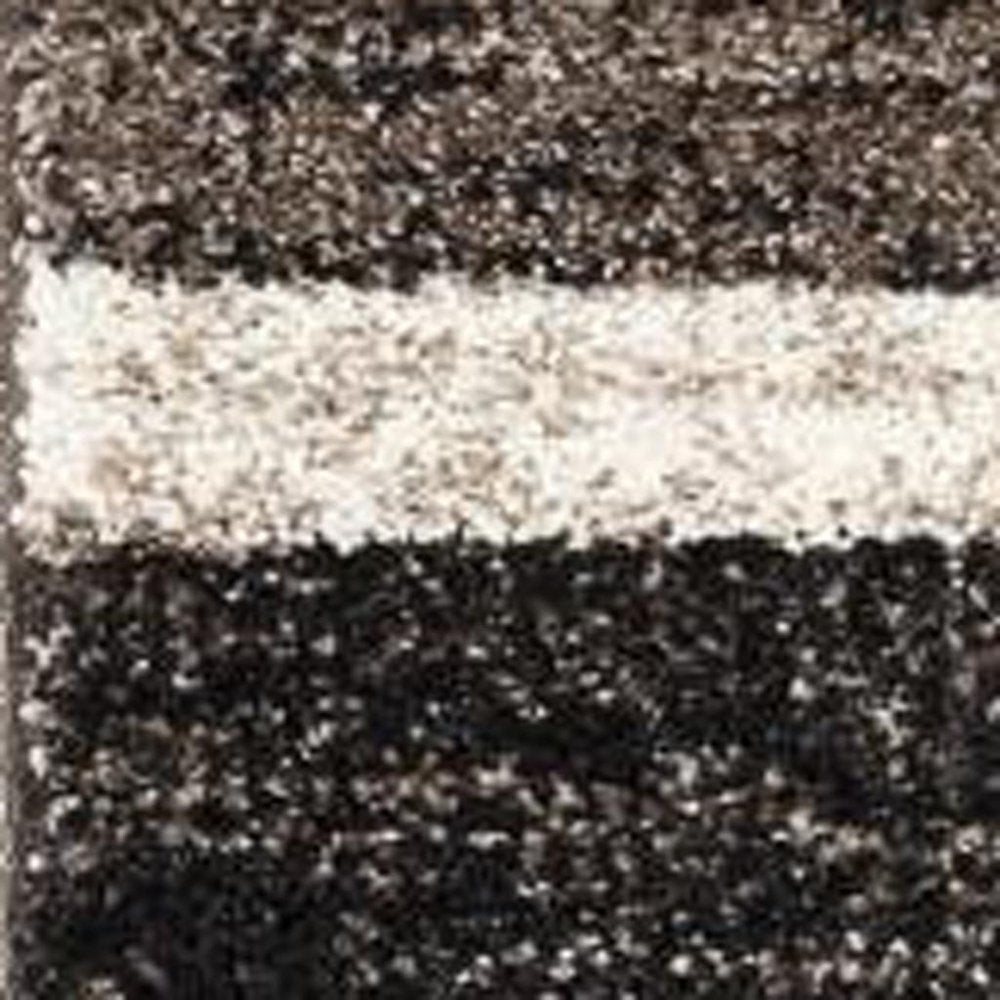 5' X 8' Brown And Beige Abstract Blocks Area Rug