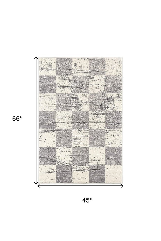 7' X 9' Gray and White Checkered Power Loom Distressed Area Rug