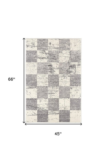 5' X 8' White And Gray Checkered Area Rug