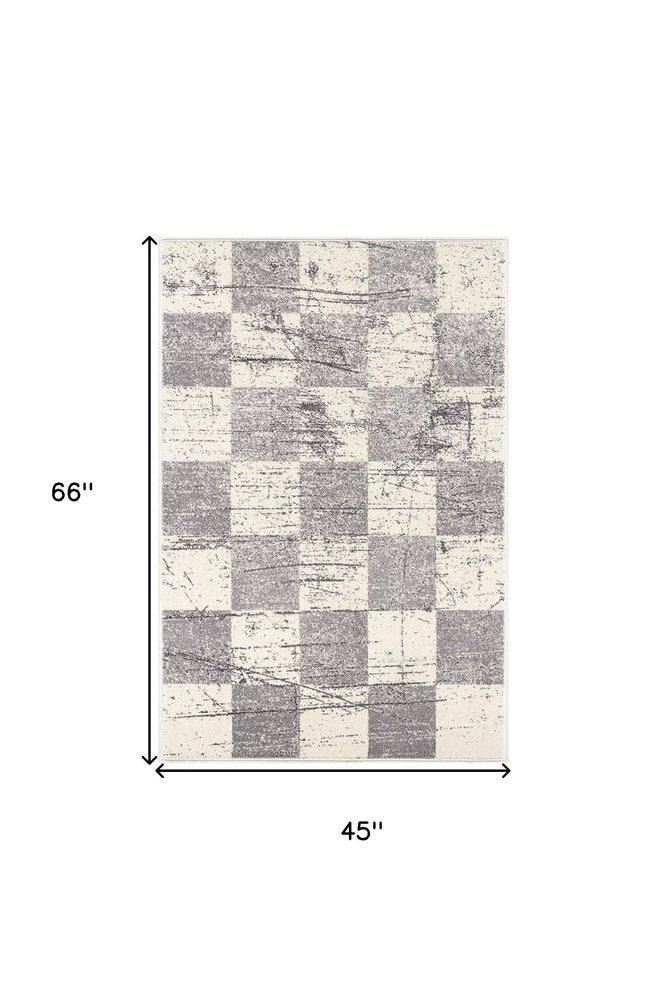 7' X 9' Gray and White Checkered Power Loom Distressed Area Rug