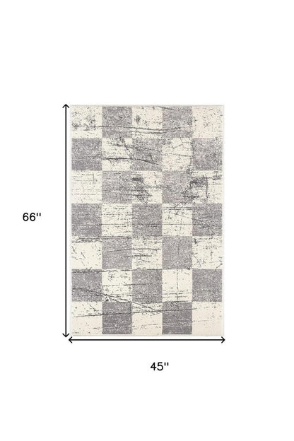 7' X 9' Gray and White Checkered Power Loom Distressed Area Rug