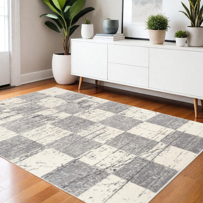 7' X 9' Gray and White Checkered Power Loom Distressed Area Rug
