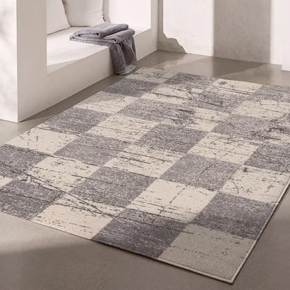 7' X 9' Gray and White Checkered Power Loom Distressed Area Rug
