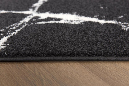 8' X 11' Black And White Abstract Breakage Area Rug