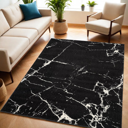 7' X 9' Black And White Abstract Breakage Area Rug