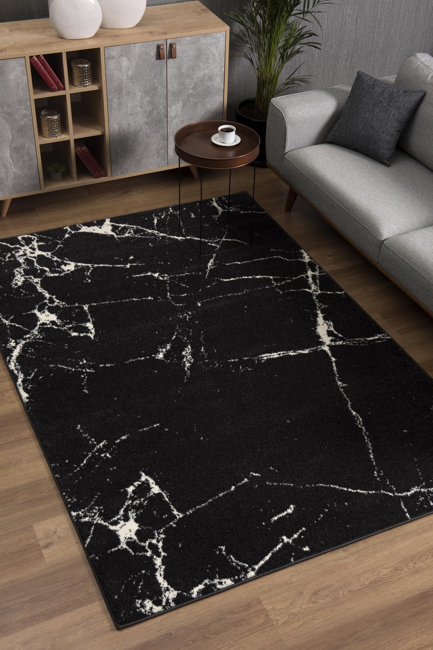 7' X 9' Black And White Abstract Breakage Area Rug