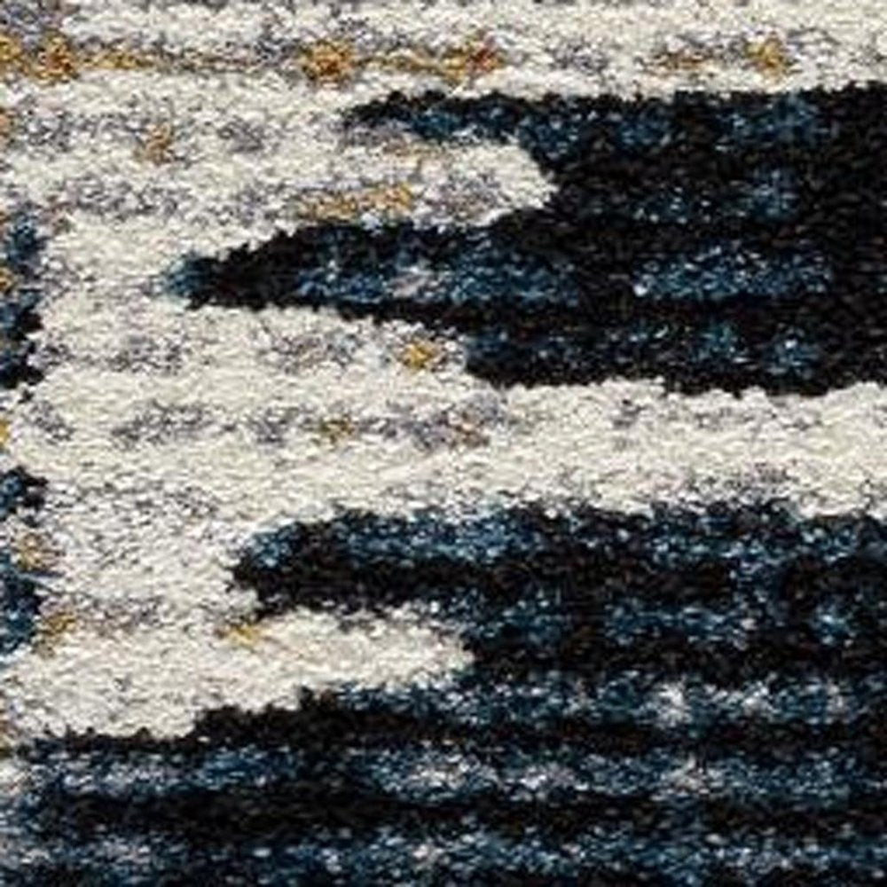 4' X 6' Blue And Ivory Abstract Area Rug