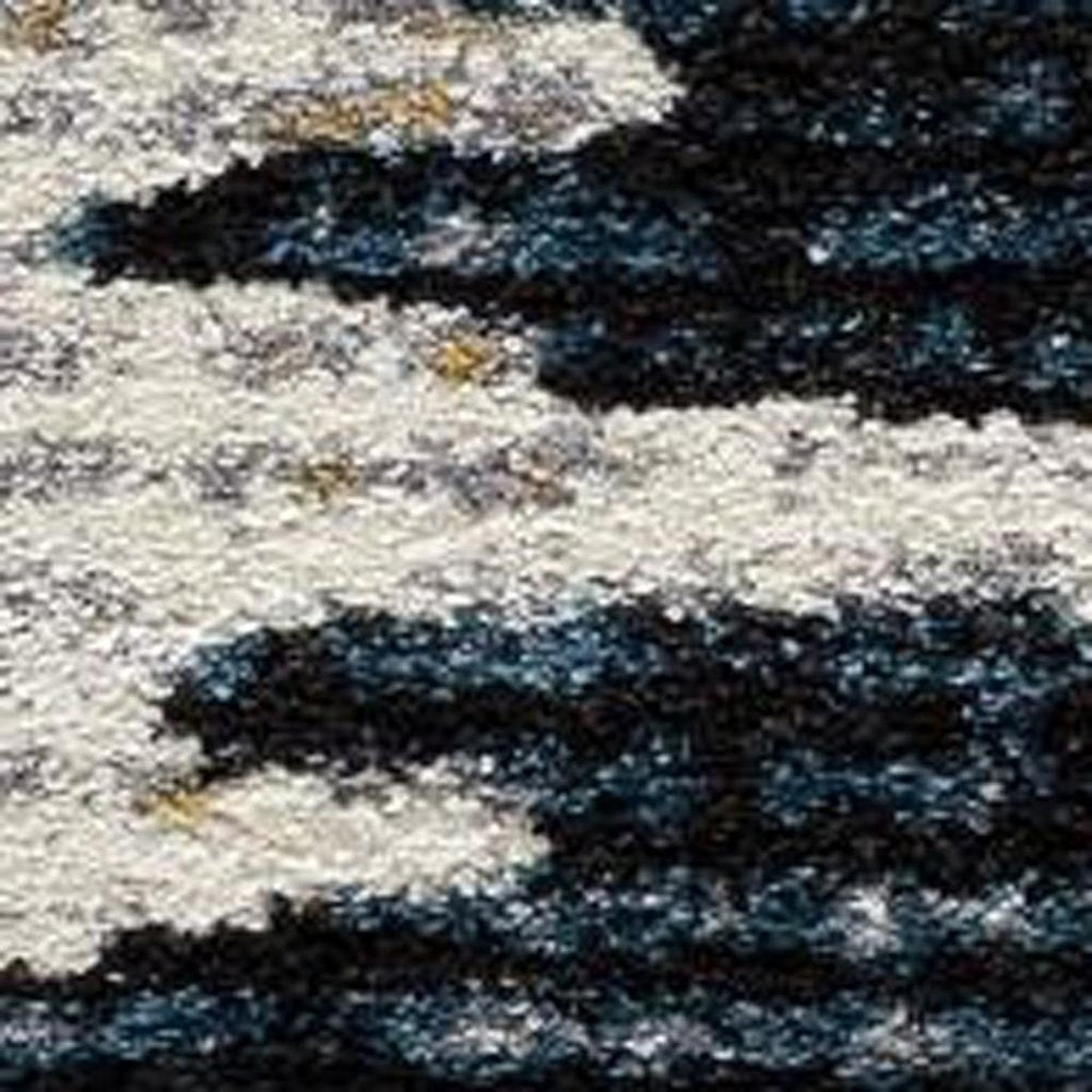 4' X 6' Blue And Ivory Abstract Area Rug