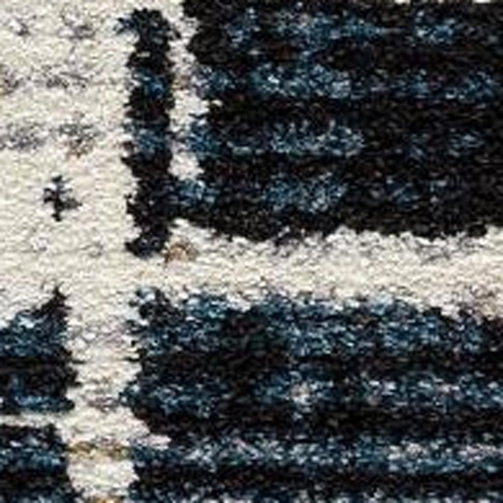 4' X 6' Blue And Ivory Abstract Area Rug
