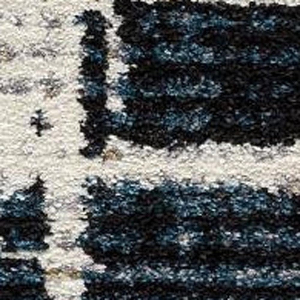 4' X 6' Blue And Ivory Abstract Area Rug