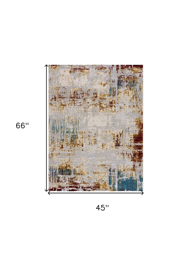 3' X 5' Beige And Gold Abstract Area Rug