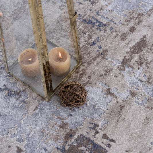 7' X 10' Beige And Ivory Abstract Area Rug