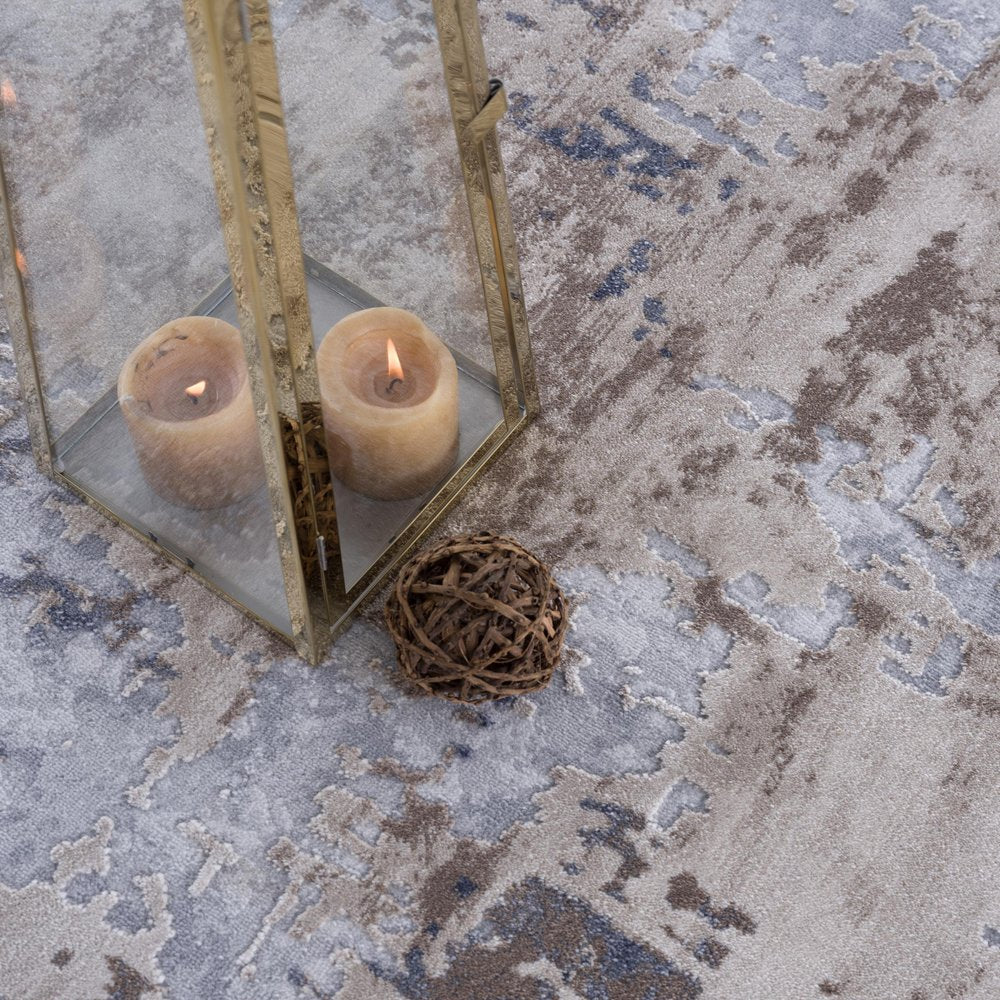 7' X 10' Beige And Ivory Abstract Area Rug