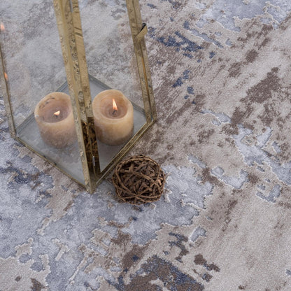 7' X 10' Beige And Ivory Abstract Area Rug