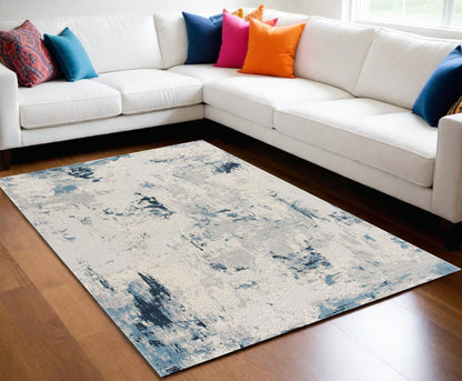 3' X 5' Blue And Ivory Abstract Strokes Area Rug