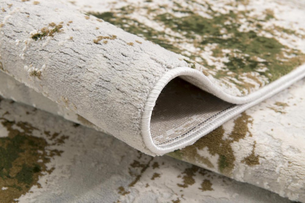 5' X 7' Green And Ivory Abstract Area Rug