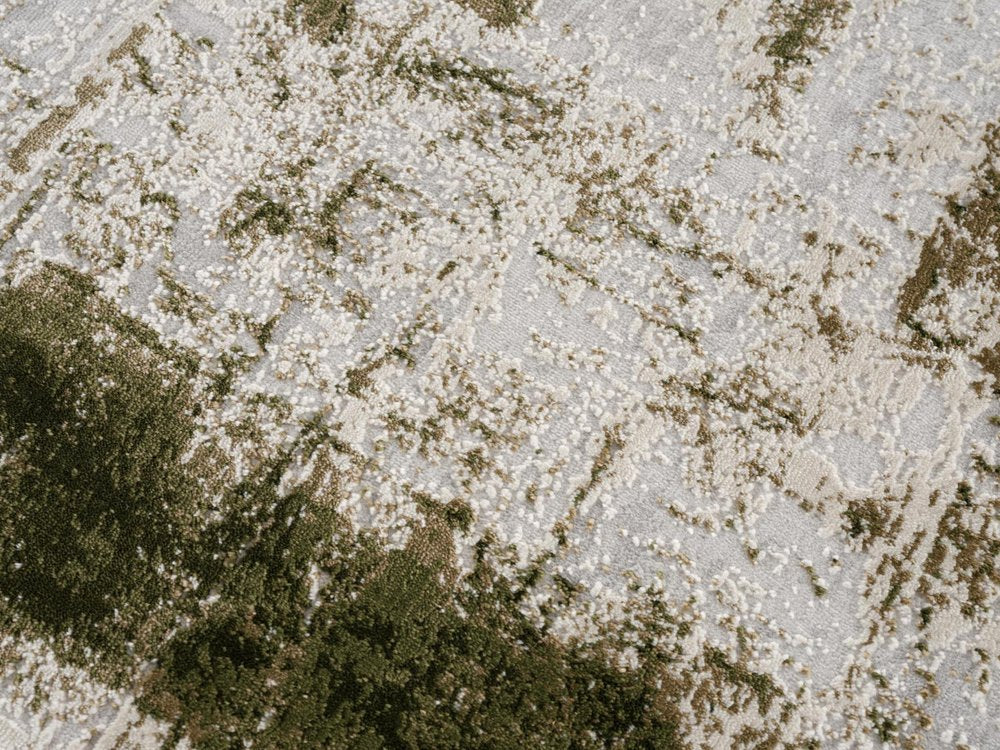 5' X 7' Green And Ivory Abstract Area Rug