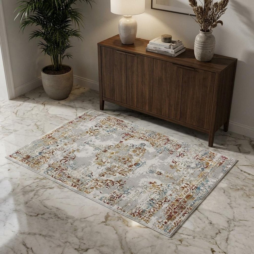 4' X 6' Gray And Beige Distressed Ornate Area Rug