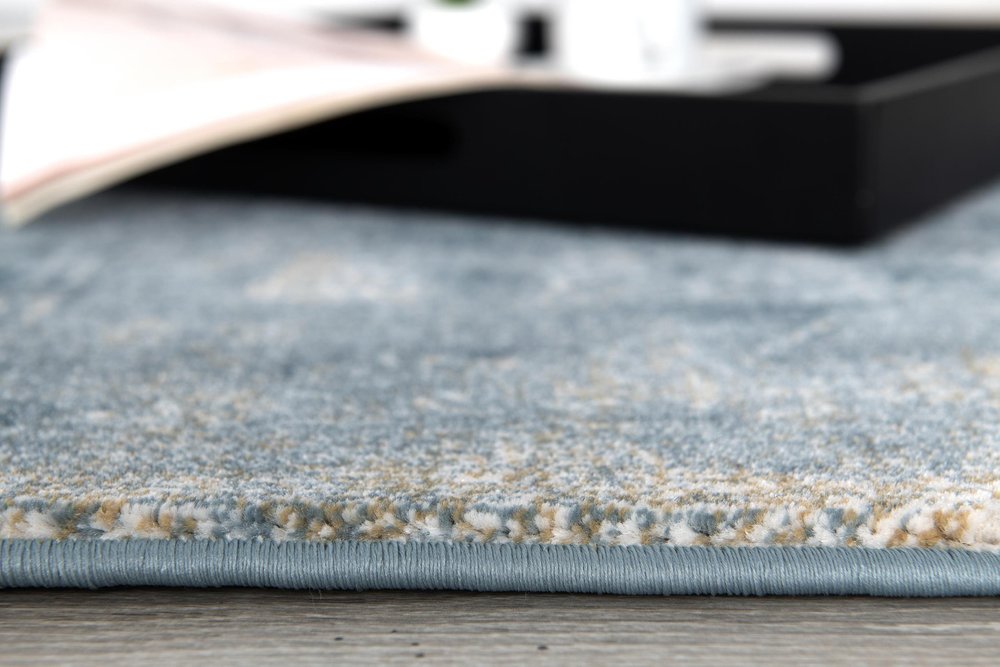6' X 9' Blue And Ivory Abstract Dhurrie Area Rug