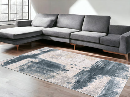 5' X 7' Blue And Ivory Abstract Dhurrie Area Rug